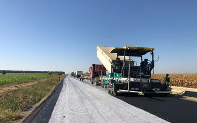 Primul strat de asfalt pe Centura Nojorid