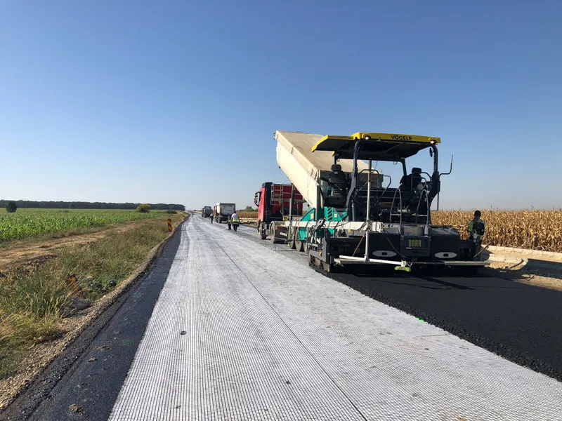 Primul strat de asfalt pe Centura Nojorid